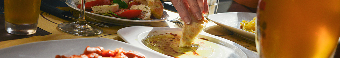 Eating Mediterranean at Amaranth restaurant in New York, NY.